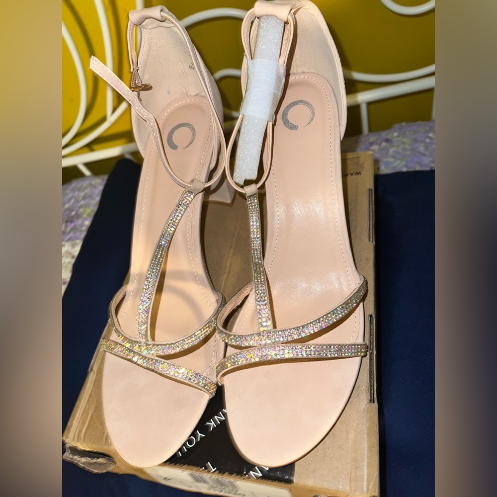 Brand new women’s heels. Never worn, still in box. Size 11.